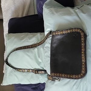 Black leather shoulder bag with studded detail on purse and strap